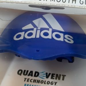 Adidas new in box mouth guard.